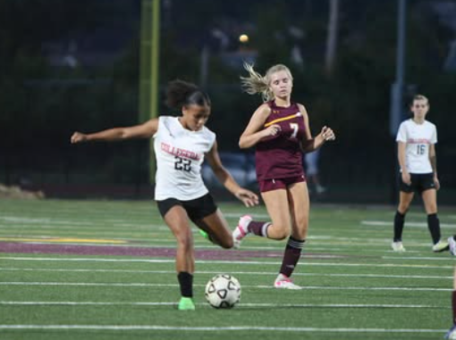 9th grader Kati Toutoute goes in for a shot during a game. 