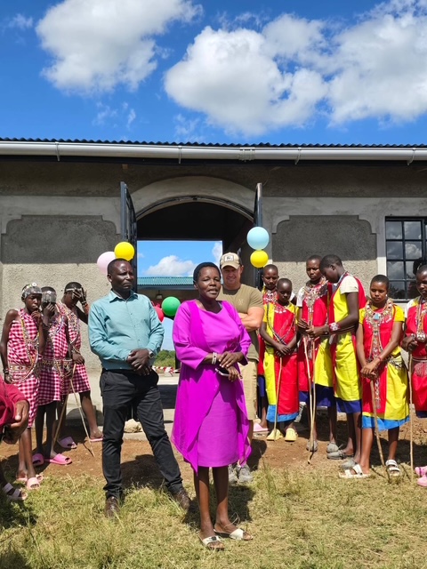 Principals Jackson and Teresa celebrate
the finished school housing